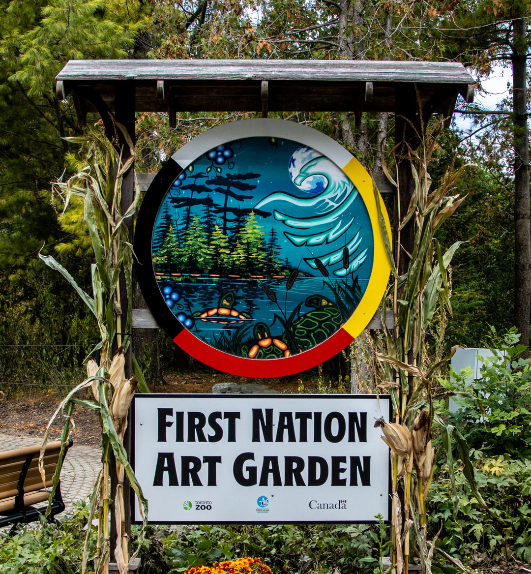 First Nation Art Garden sign with a painting at the Toronto Zoo