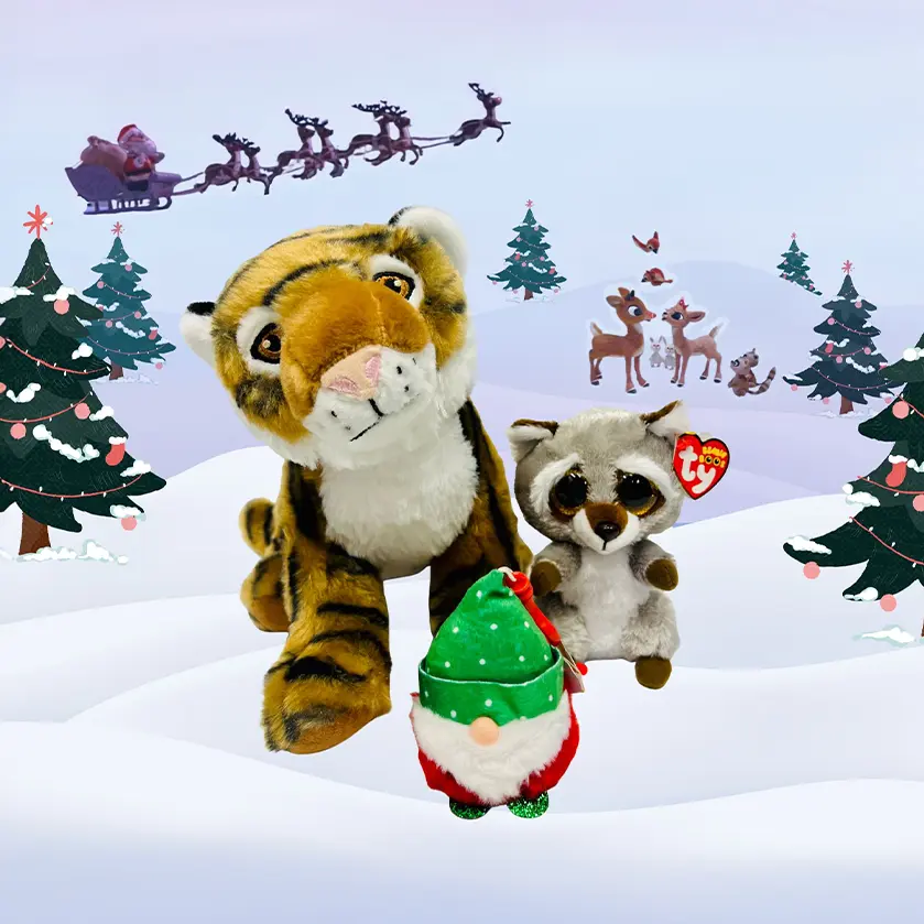 Three misfit toys sit in the snow waiting for a home