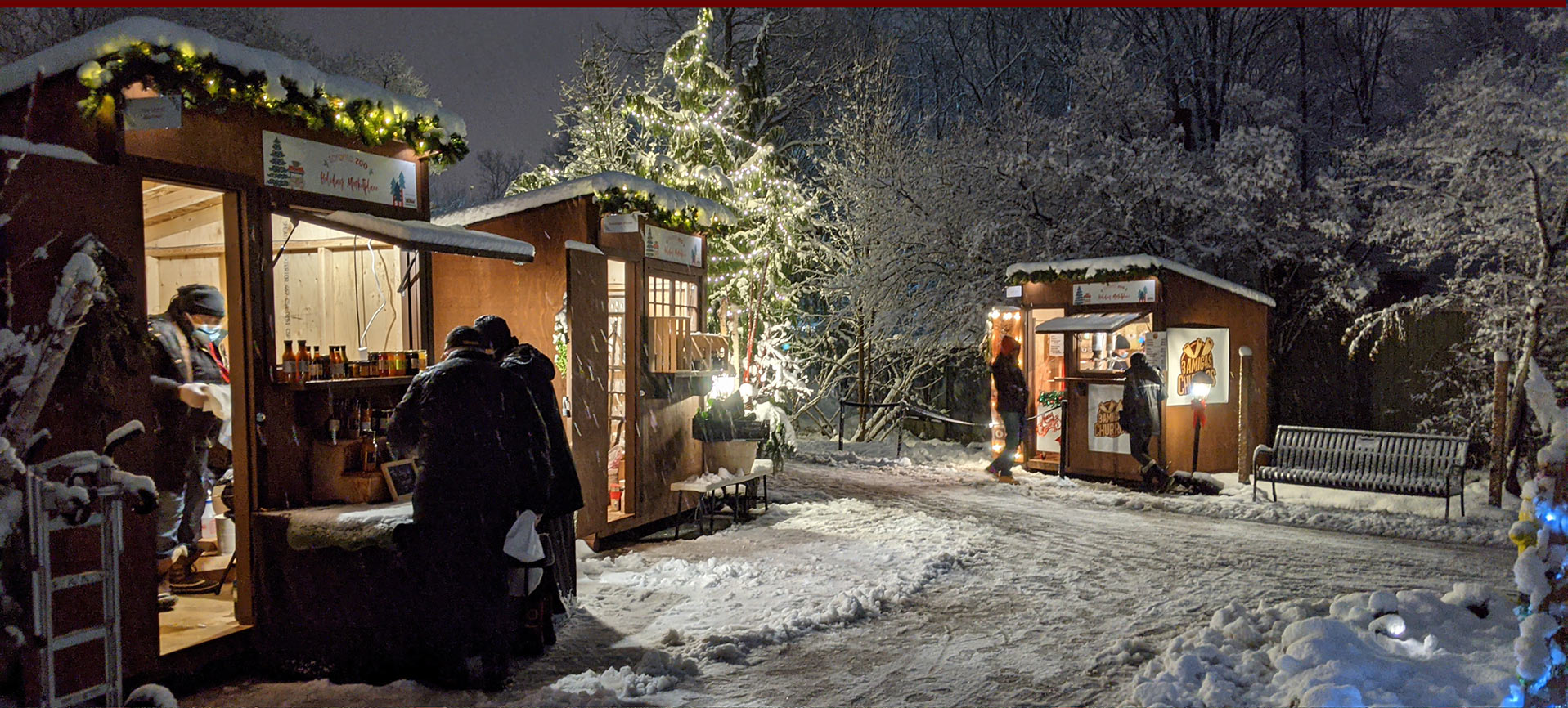 Vendors booths setup in a beautiful snow covered lane at the Toronto Zoo