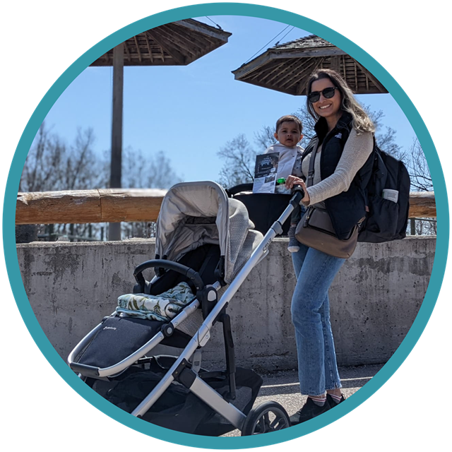 Woman and baby posing with stroller